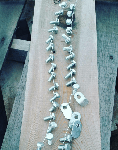 metal bolts on a copper wire that have been metal plated in Toronto